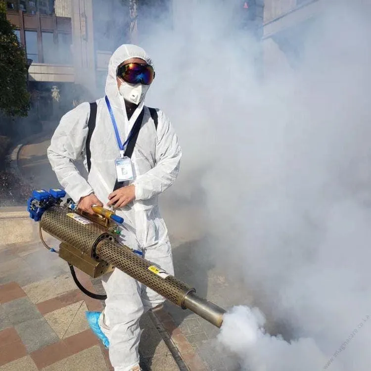 VunjaBei technician fogging an outdoor compound